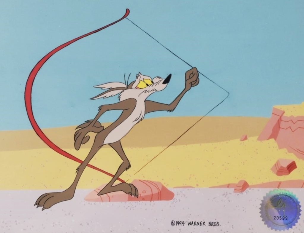 Wile E. Coyote pulling a long, curved red wire in a desert landscape.